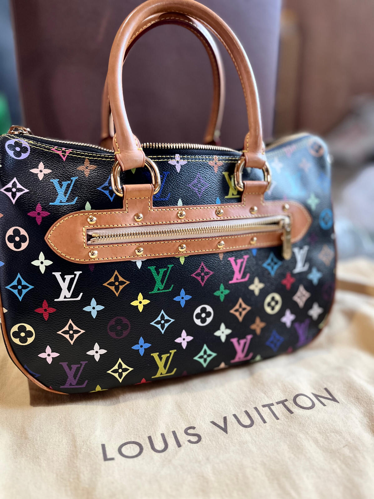 The Behind of the Louis Vuitton Monogram Multicolore Rita Bag